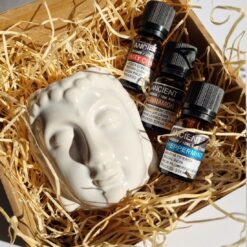 Aromatherapie Set mit aetherischen Oelen und einer Buddha Kopf Kamin2